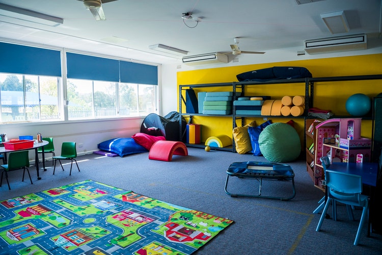 The calm, colourful sensory room.